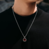 Man Mei rose-vine pendant with natural red zircon in a 925 sterling silver setting and steel chain
