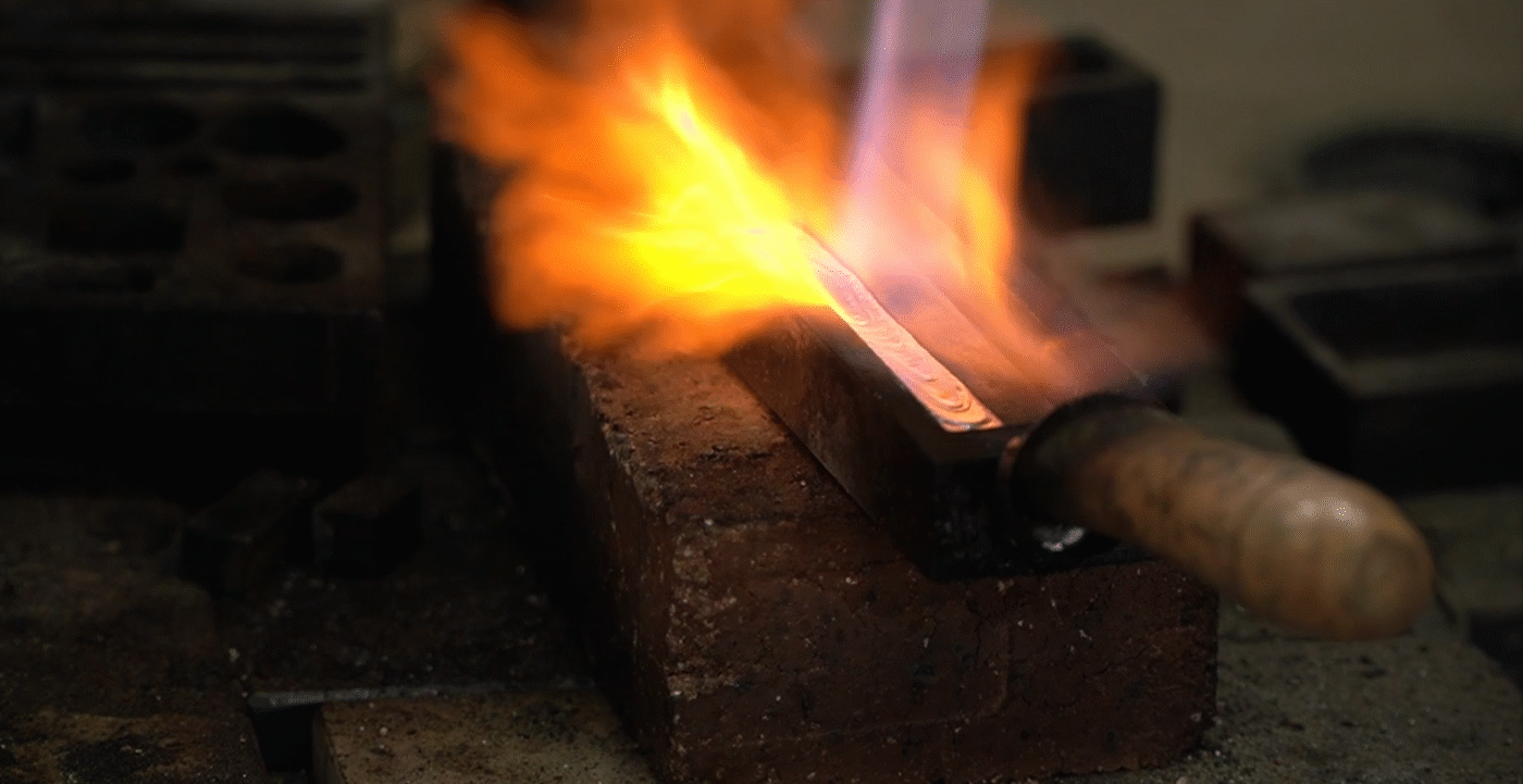 In the molten silver