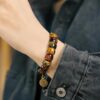 Fu Mo Yun Lei multicolor tiger eye bracelet worn on the wrist