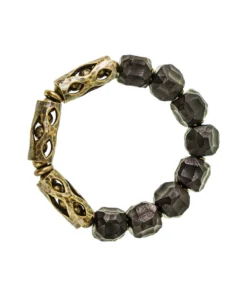Hunyuan Panjie Style A ebony wood and brass knot bracelet on a dark surface