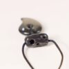 Detail of the irregular hand-carved ebony top bead on the Xuan Yao adjustable pendant necklace