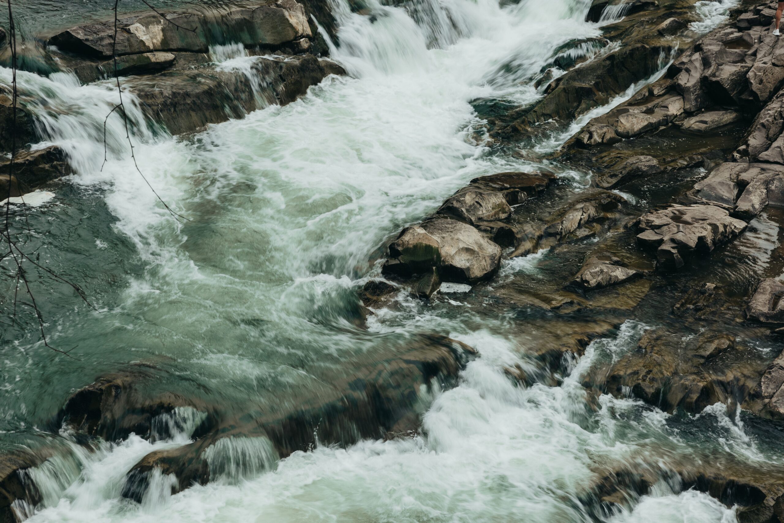 River rapids flowing over rocks