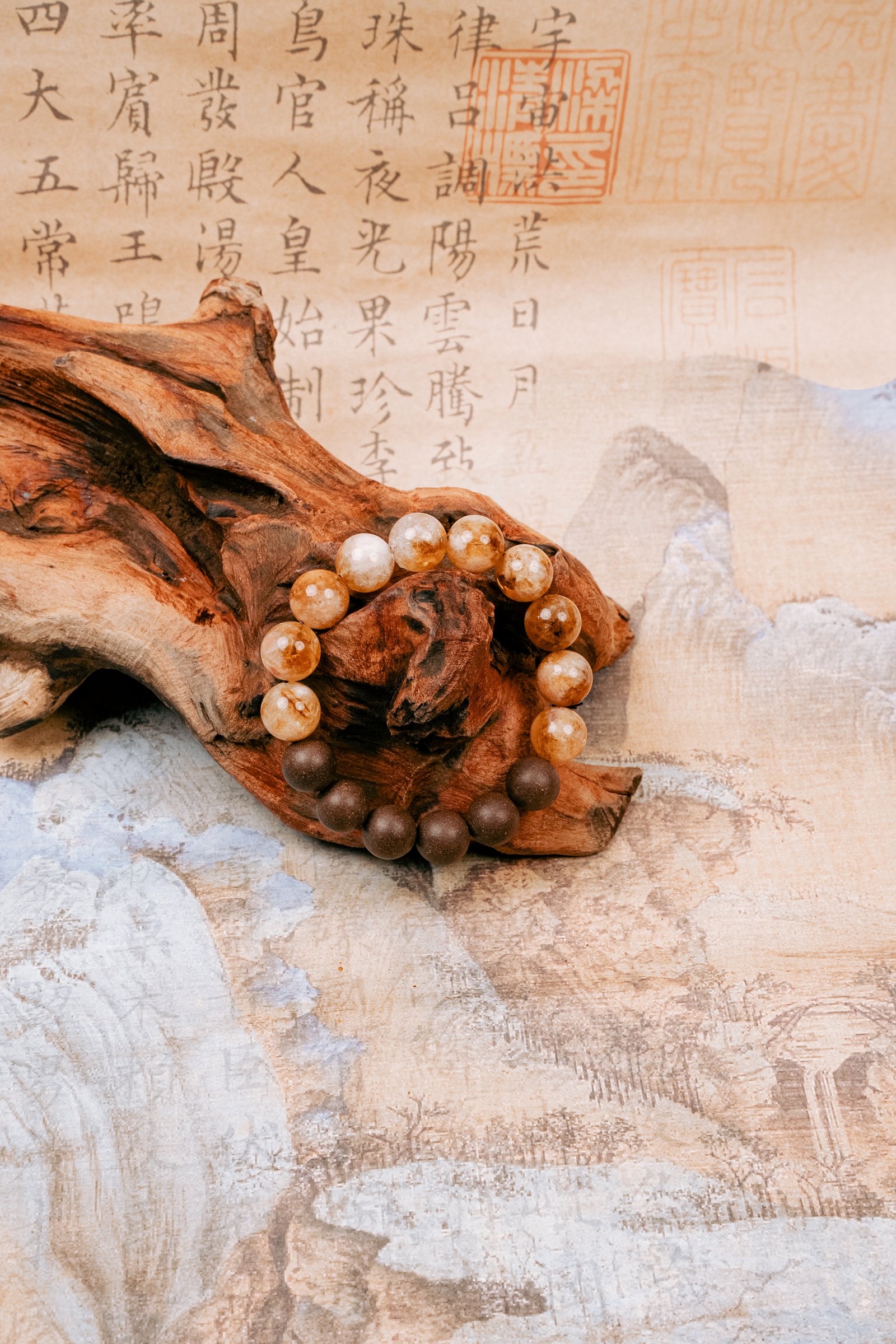 Eli Zhangzhong Fragrance Full Bracelet — brown and pale bead bracelet arranged around wood