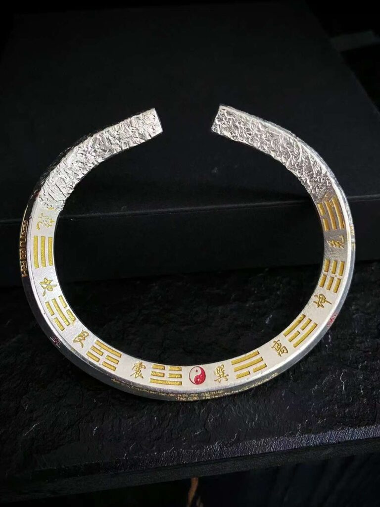 Eternal Clarity 999 Silver Taoist Bracelet — open cuff showing its inner gold-colored symbols