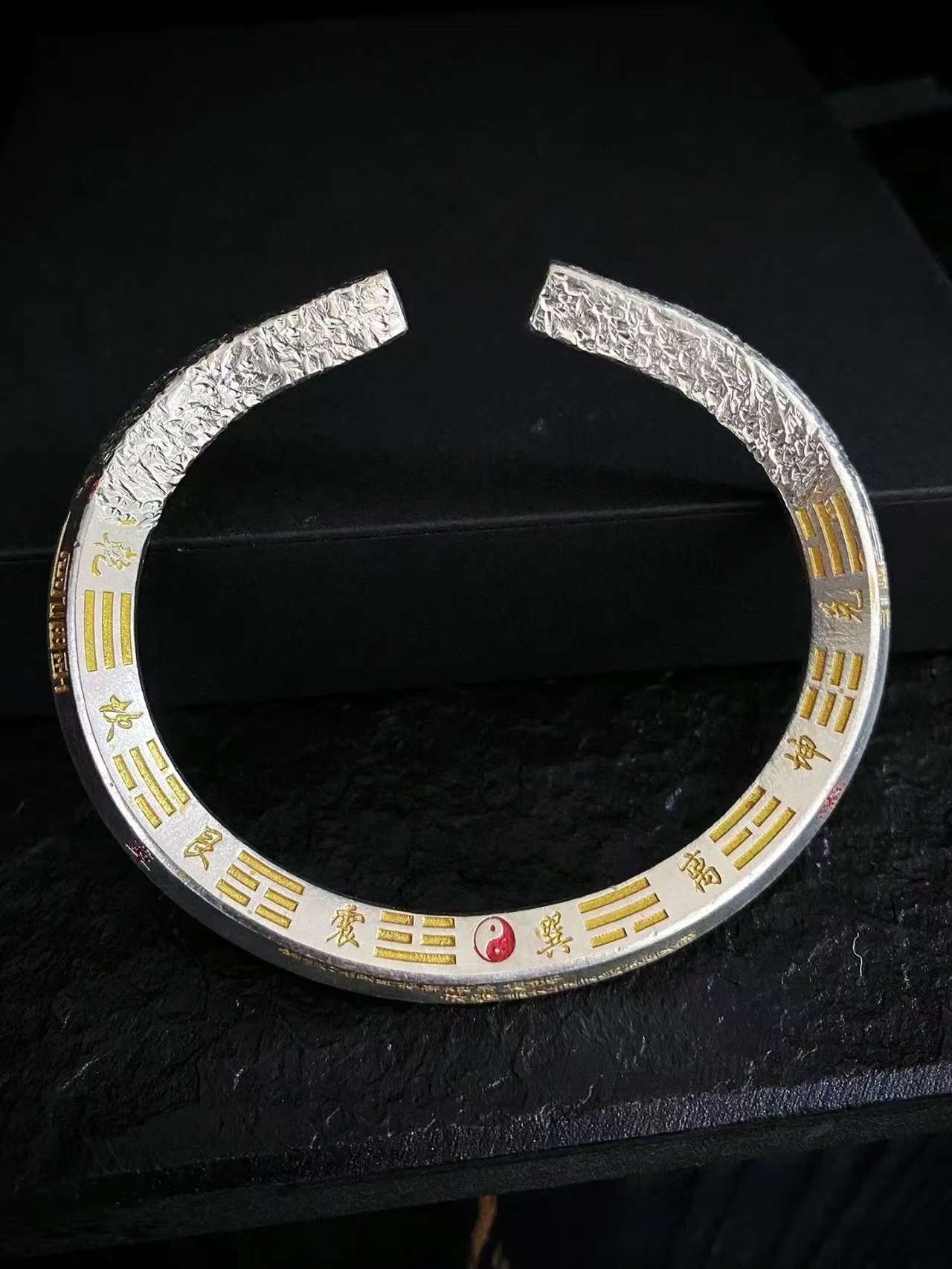 Eternal Clarity 999 Silver Taoist Bracelet — open cuff showing its inner gold-colored symbols