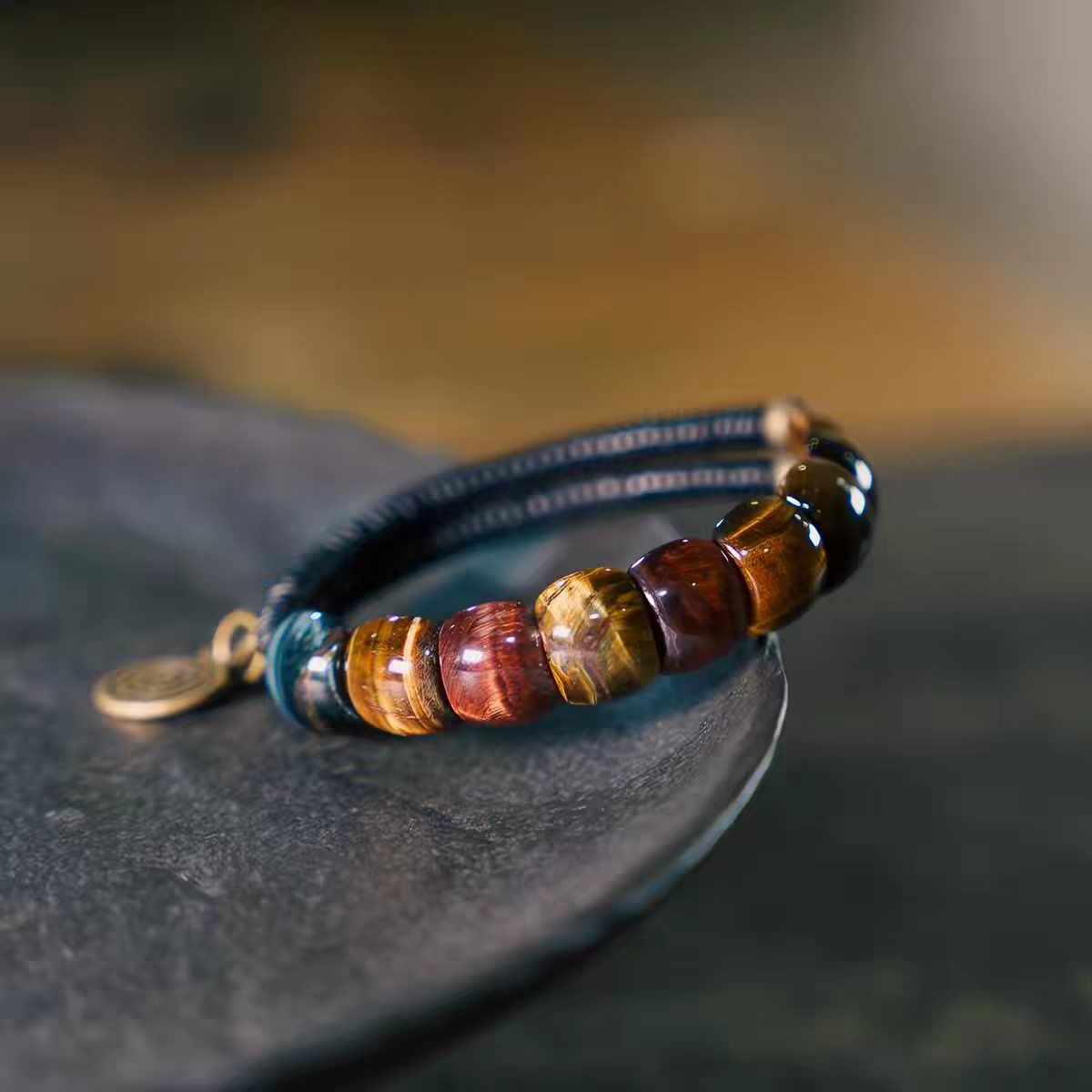 Fu Mo Yun Lei Taoist multicolor tiger eye bracelet with brass spiral charm