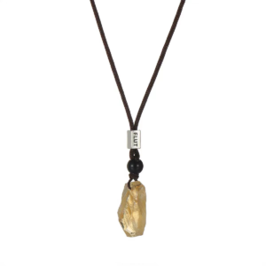 Golden Light Citrine Pendant Necklace — yellow translucent pendant on a dark cord against white
