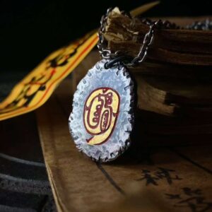 Golden Light Mantra 999 Silver Gilded Pendant — oval pendant showing its colored central emblem
