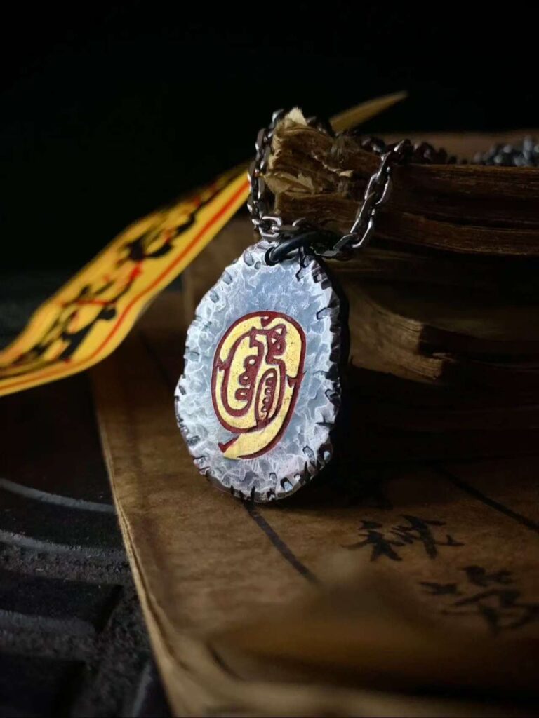Golden Light Mantra 999 Silver Gilded Pendant — oval pendant showing its colored central emblem
