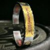 Heavenly Official Bestows Blessings 999 Silver & Gold Bracelet — open cuff showing a gold-colored central inscription