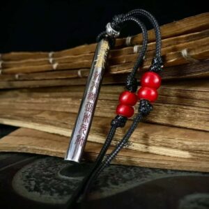 Kao Gui Rod 999 Silver Taoist Pendant — rod-shaped pendant with black cord and red beads