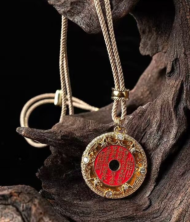 Mountain Spirit's Verse Pendant — round pendant showing a red circular face