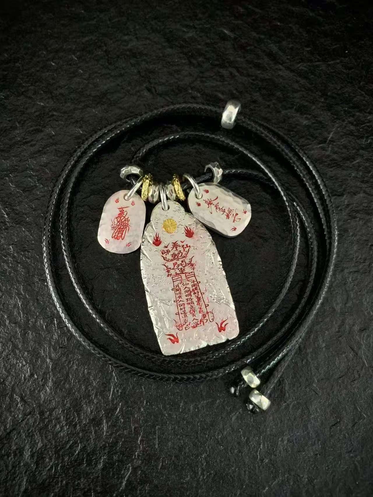 Six Ding & Six Jia 999 Silver Taoist Pendant — three-charm pendant with its cord arranged in a circle