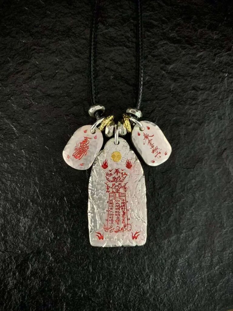 Six Ding & Six Jia 999 Silver Taoist Pendant — pendant with three inscribed charms shown on a black cord