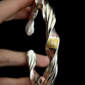 Thirty-Six Heavenly Generals 999 Silver Twisted Bracelet — twisted cuff held upright with an inscribed panel