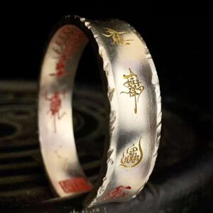 Wenchang Emperor 999 Silver & Gold Bracelet — open cuff showing gold-colored outer motifs