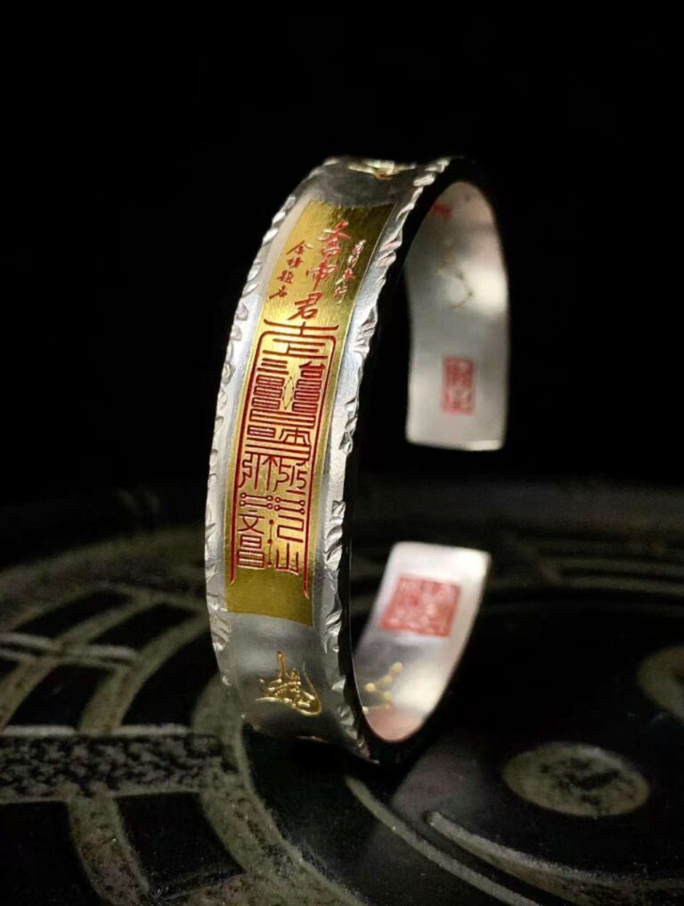 Wenchang Emperor 999 Silver & Gold Bracelet — cuff showing a tall gold-colored inscription panel