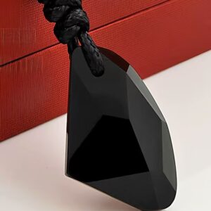 Wishful Shimmer Rainbow Eye Obsidian Pendant — faceted black pendant resting beside a red box