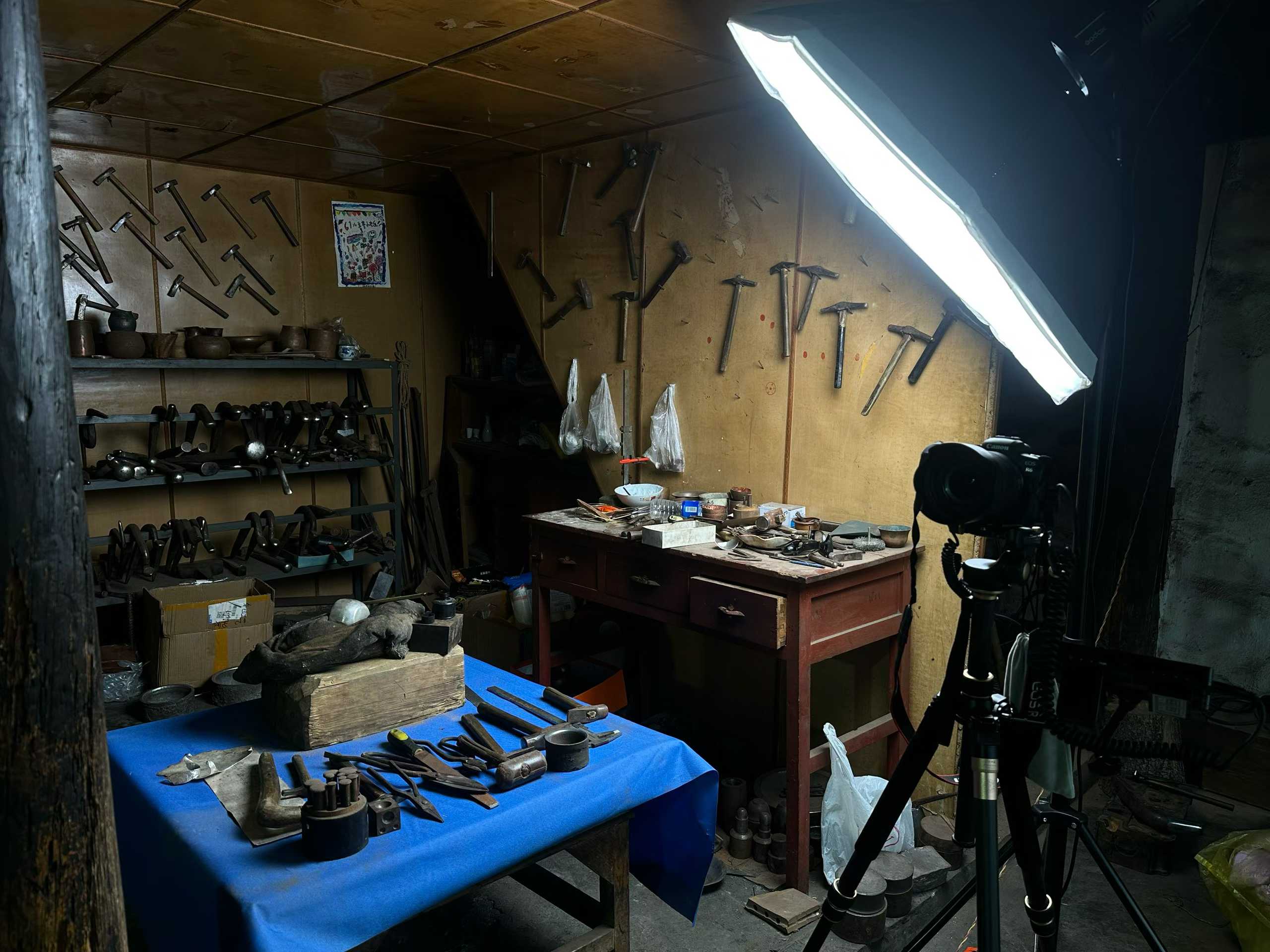 Workbench with hand tools under bright task lights