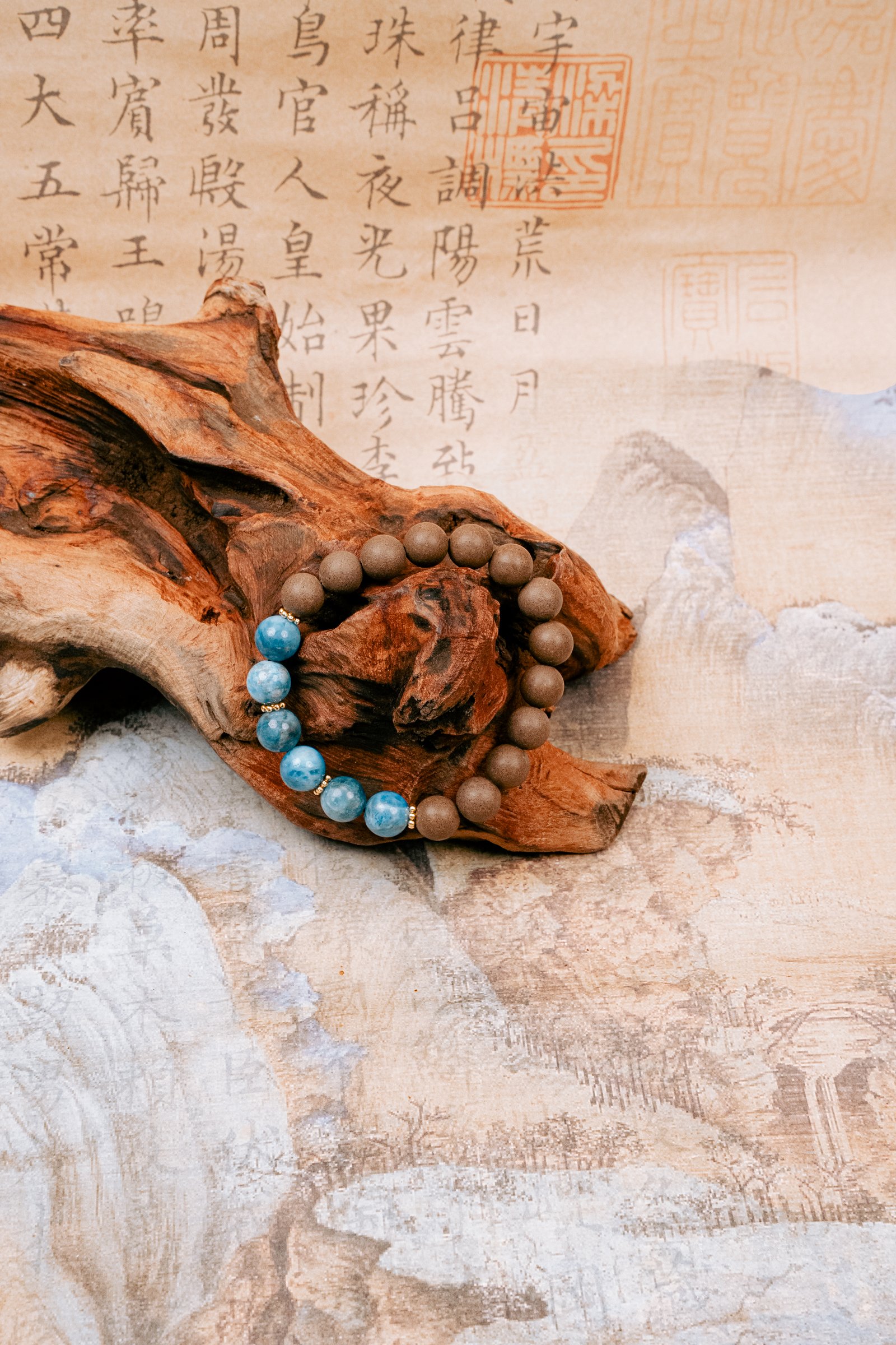 Wuzhen Herbal Incense Bracelet — brown and bright blue bead bracelet arranged around wood